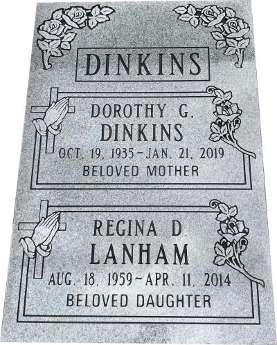 gray granite double interment headstone with roses and praying hands with cross emblems